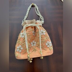 Women’s Luxuries Pearl &glass beads embellished potli bags in peach color